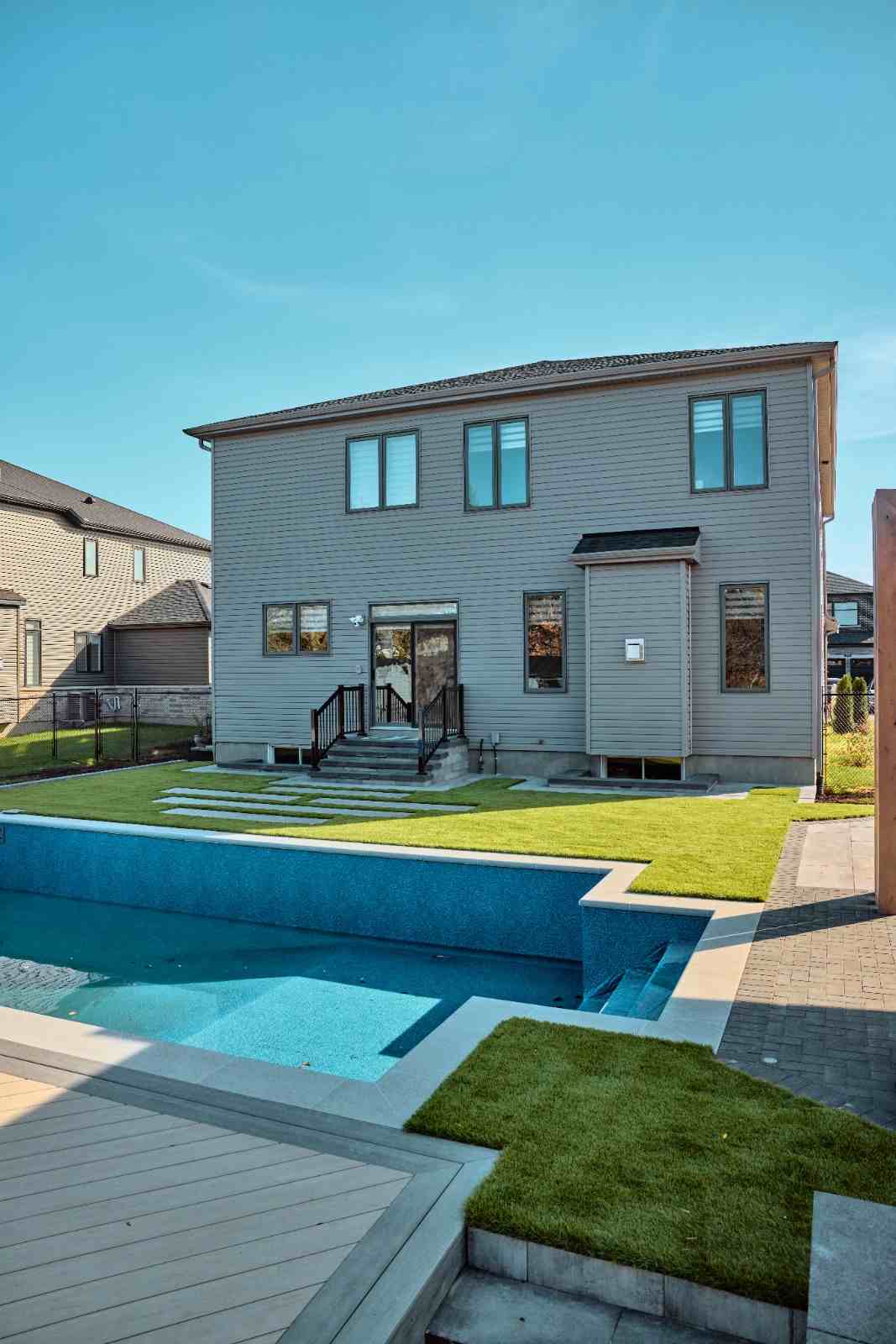 Modern Backyard Oasis with Pool — Manotick — 11