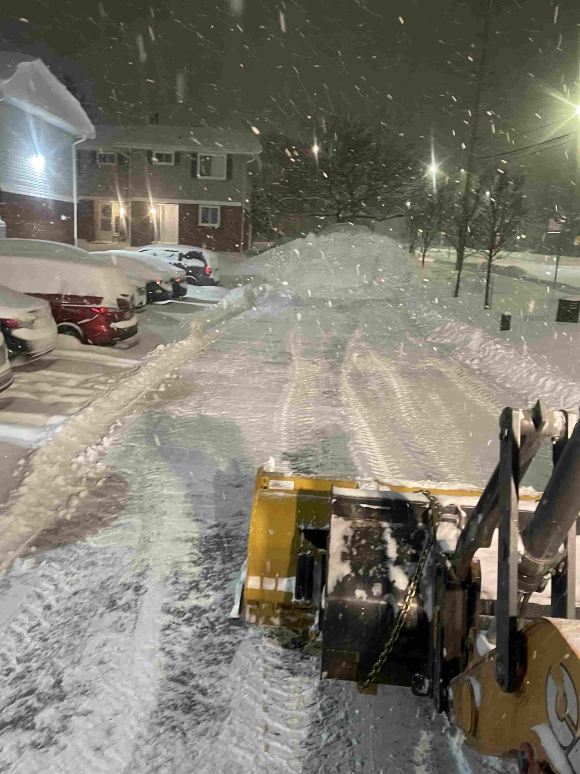 A snowplow works through the night in Ottawa for ensuring clean roads during winter time